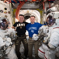 nasa-astronauts-andrew-morgan-and-nick-hague-pose-with-their-spacesuits_48601644776_o.jpg
