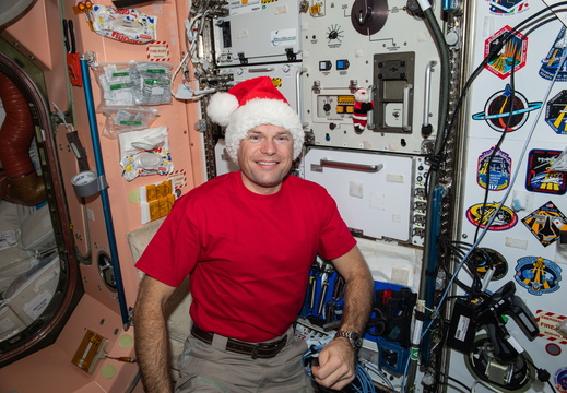 astronaut-andreas-mogensen-poses-wearing-a-santa-claus-hat 53336444298 o