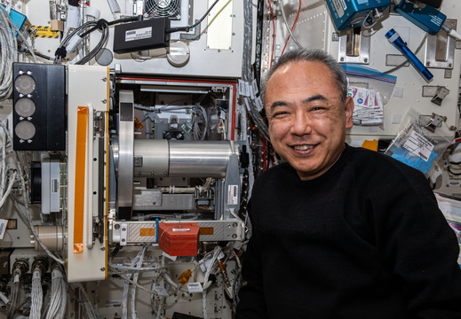 astronaut-satoshi-furukawa-poses-for-a-portrait-next-to-research-hardware 53316253003 o