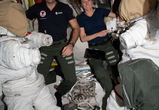 astronauts-andreas-mogensen-and-loral-ohara-work-on-spacesuits 53234606463 o