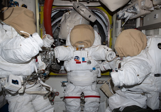 three-spacesuits-are-pictured-inside-the-quest-airlock 53281639422 o