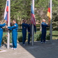 11-04-30_At the Cosmonaut Hotel crew quarters in Baikonur, Kazakhstan, the Expedition 40_41 prime and backup crewmembers raise the flags of Russia, the United States, Germany and Kazakhstan during traditional ce_o.jpg