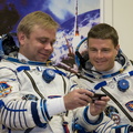 12-37-47-2_At the Baikonur Cosmodrome in Kazakhstan, Expedition 40_41 Soyuz Commander Max Suraev of the Russian Federal Space Agency (Roscosmos, left) and NASA Flight Engineer Reid Wiseman (right) look at pictur_o.jpg