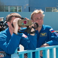 15-49-09_At the Baikonur Cosmodrome in Kazakhstan, Expedition 40_41 Flight Engineer Reid Wiseman of NASA (left) peers through high-powered binoculars during a training session May 16 as Soyuz Commander Max Surae_o.jpg