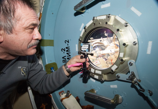 Commander Pavel Vinogradov Monitors Spacewalk - 9611712956 31c7ce4024 o