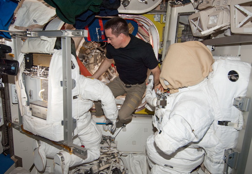 Astronaut Chris Cassidy Works with Spacesuits - 9422877179 2c2b88a7b2 o