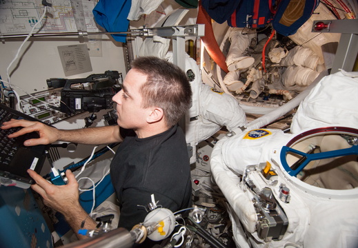 Astronaut Chris Cassidy Works with Spacesuits - 9422876947 a12cbcc81e o