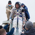 cosmonaut-anatoly-ivanishin-is-helped-out-of-the-soyuz-ms-16-spacecraft_50520314778_o.jpg