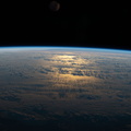 the-suns-glint-beams-off-a-partly-cloudy-south-pacific_50162550913_o.jpg