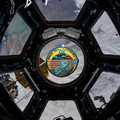 the-expedition-62-mission-patch-floats-inside-the-seven-window-cupola_49596884056_o.jpg