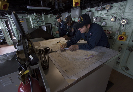 Navy personnel monitor conditions
