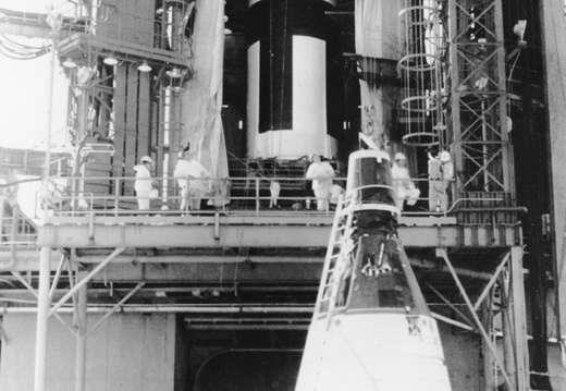 Gemini II being hoisted for mating with Titan II booster
