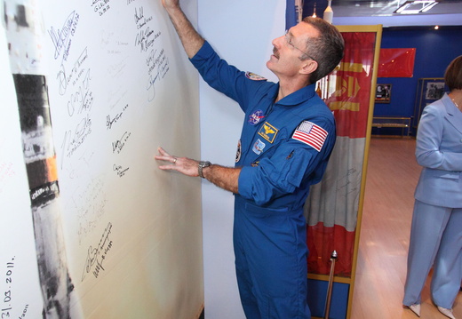 nasa2explore 6329003085 Commander Dan Burbank Signs Soyuz Poster