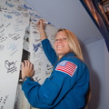 Flight Engineer Karen Nyberg Signs Mural - 8805239233_221ca3b19b_o.jpg